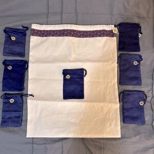 Tory Burch dust bag and 7 jewelry bags